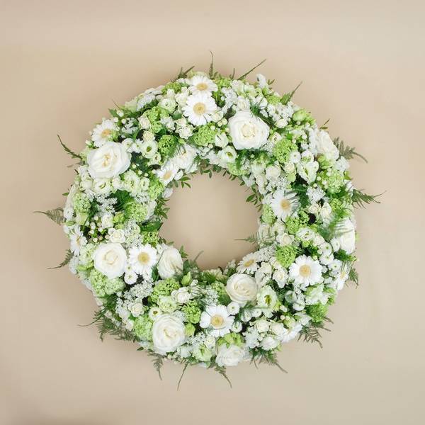 Funeral wreath with roses and gerberas