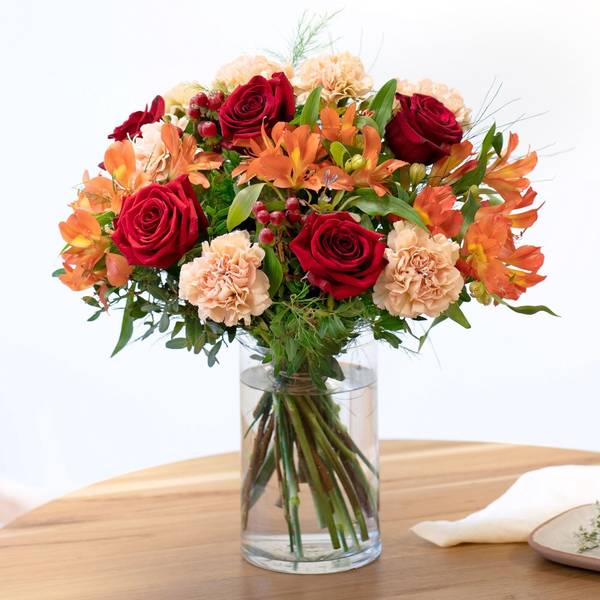 Mixed bouquet of warm orange and red tones